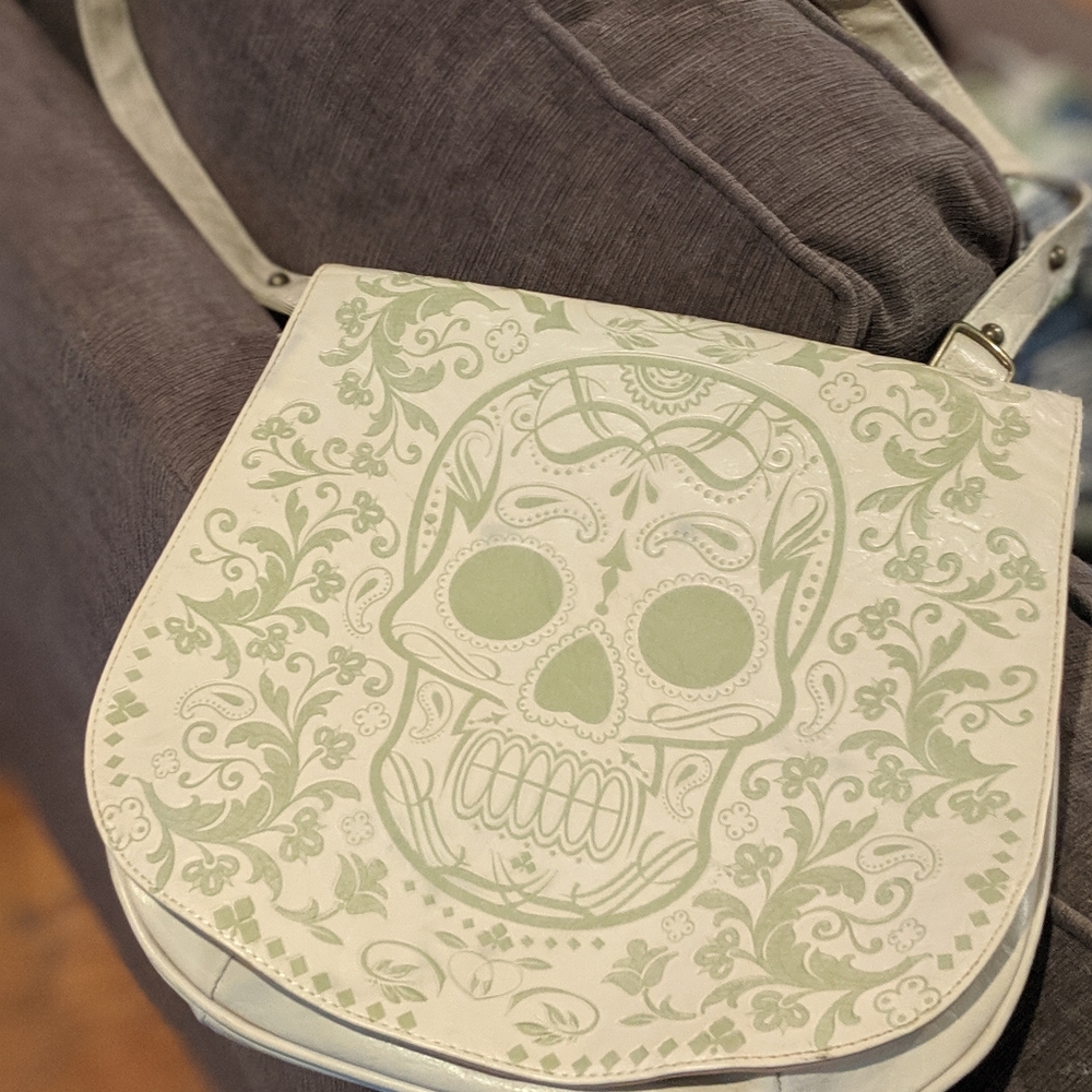 Embossed sugar skull cross body bag, Tan